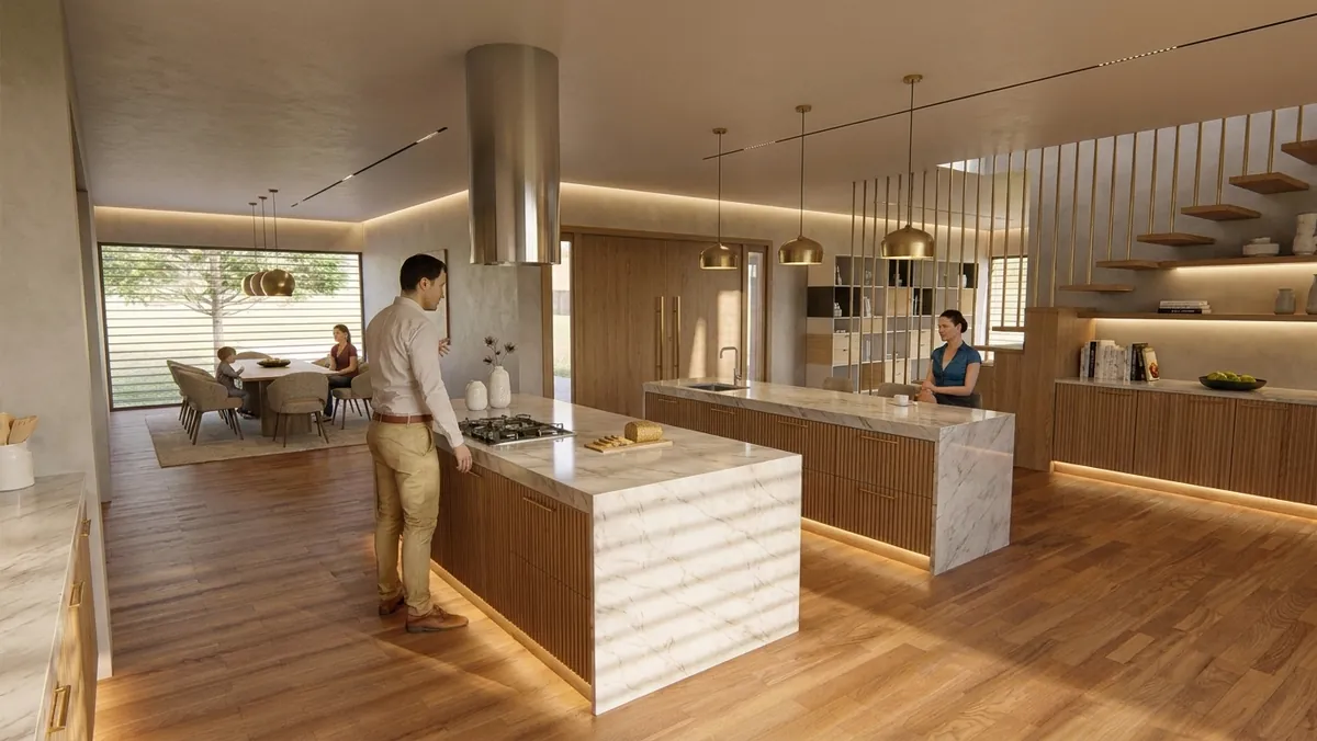 Interior de la Casa Cocina: la isla central bajo la campana cilíndrica